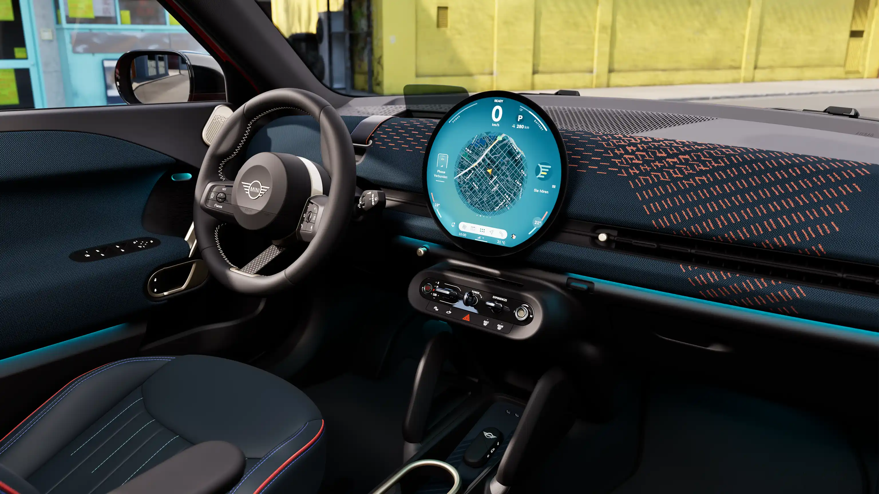 Vidéo présentant en détail l’intérieur d’un MINI Aceman 100 % électrique. La caméra fait un panoramique de l’intérieur et montre le revêtement bleu