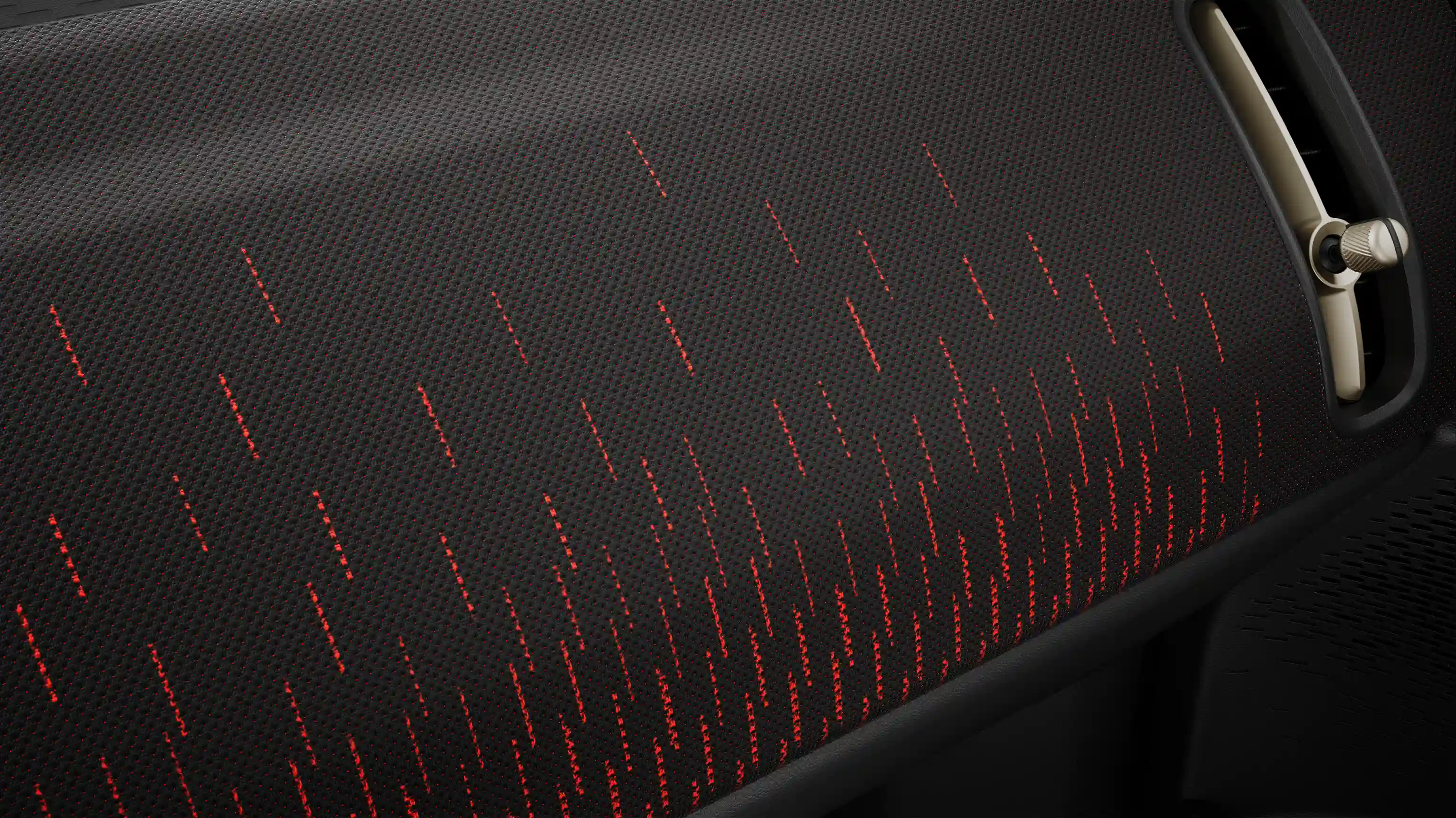 Vue du tableau de bord du MINI JCW Countryman Electric en rouge et noir