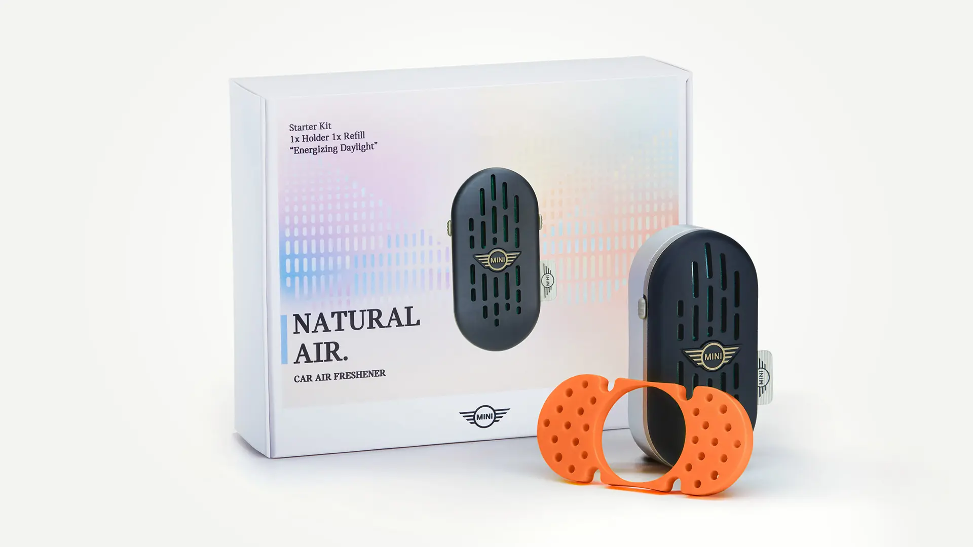 Présentation du kit de démarrage pour désodorisant pour voiture MINI Natural Air, qui comprend le porte-parfum et le bâtonnet.