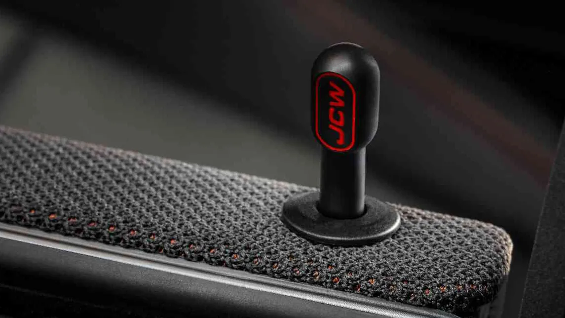 Bouton de verrouillage John Cooper Works pour MINI au design RED LINE. 