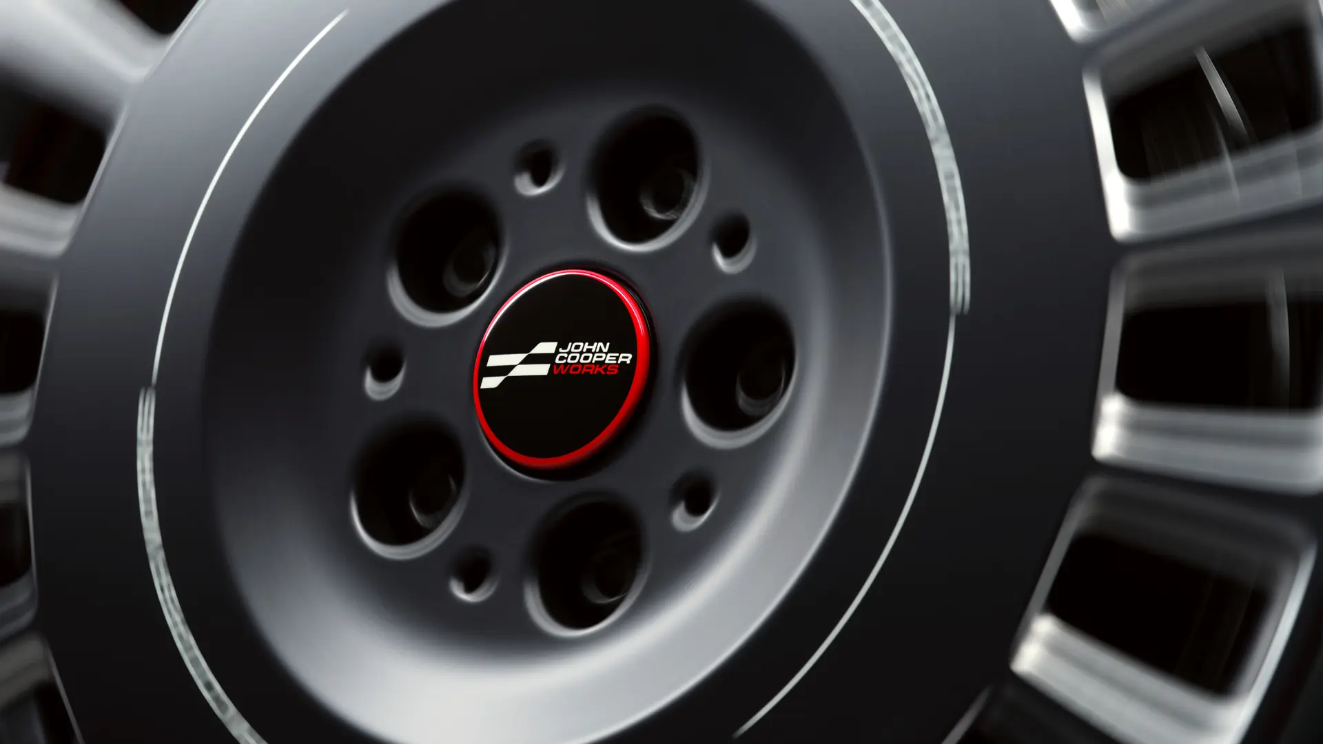 Chapeau de moyeu flottant John Cooper Works qui ne tourne pas avec la roue mais reste horizontal pendant la conduite. 